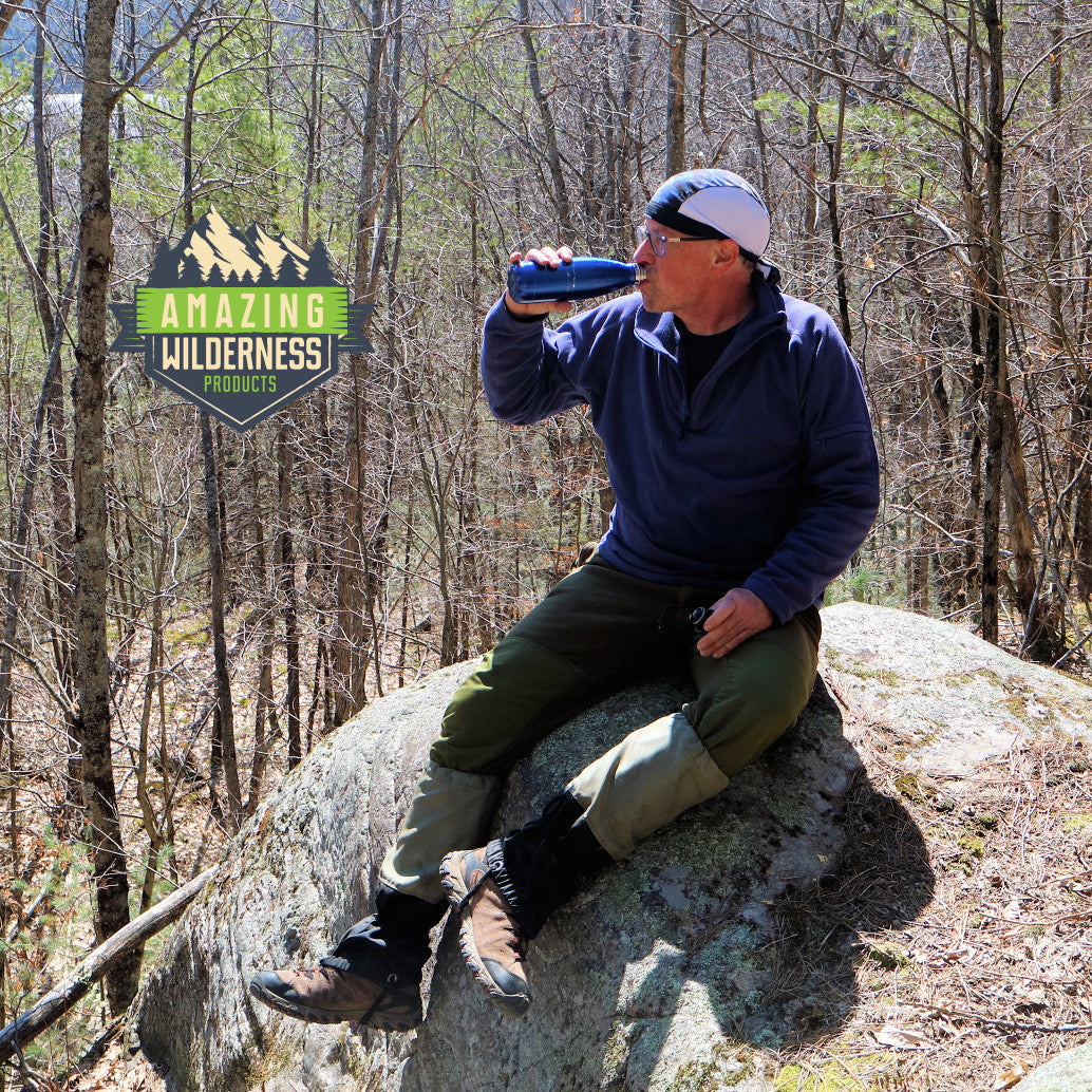 Man wearing total performance cap and drinking