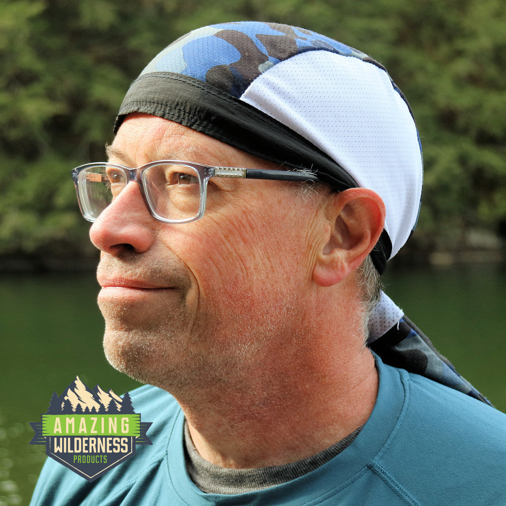 Man wearing total performance cap blue camouflage